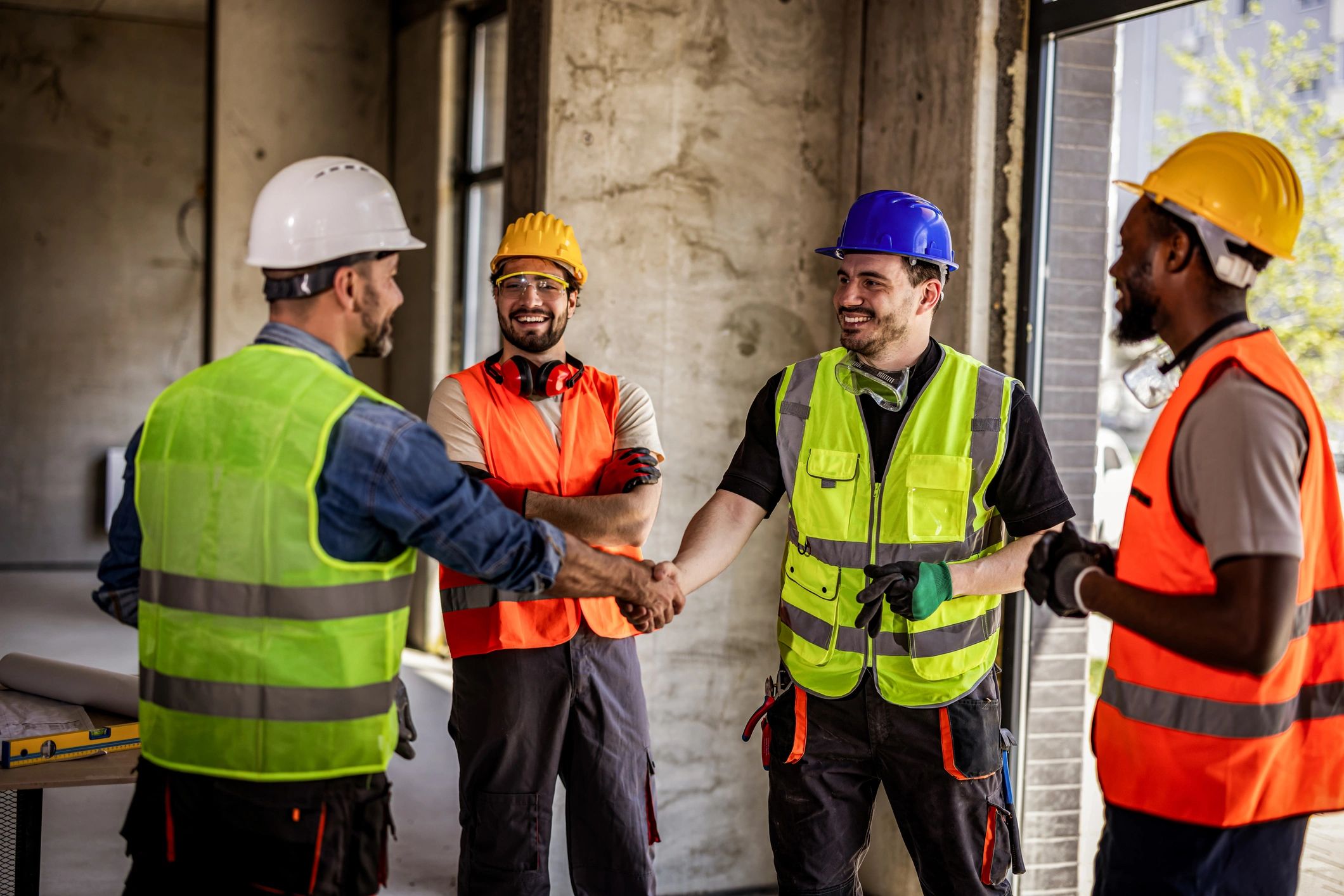 Builders and crew on site representing teamwork and trust